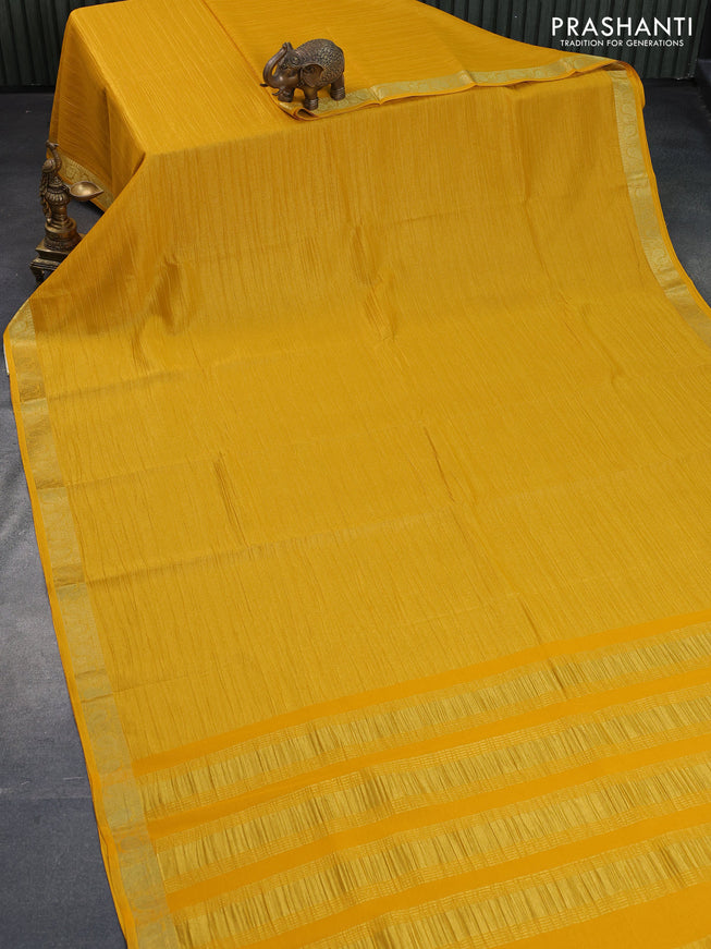 Crushed tissue saree yellow with plain body and paisley zari woven border