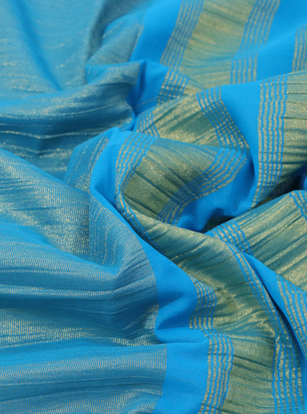 Crushed tissue saree cs blue with plain body and zari woven border