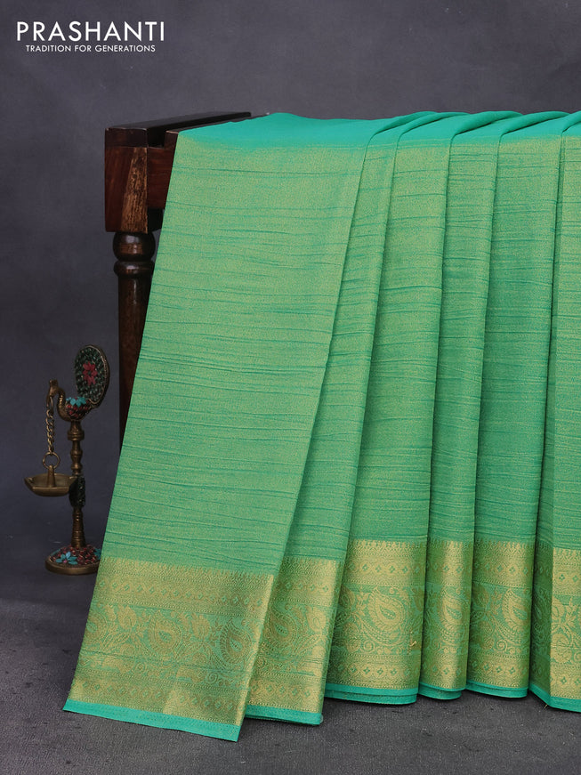 Crushed tissue saree teal green with plain body and zari woven border