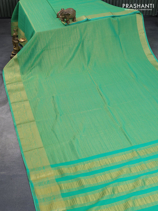 Crushed tissue saree teal green with plain body and zari woven border