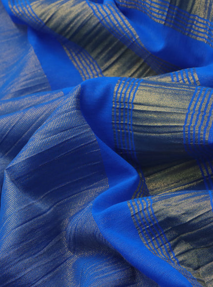 Crushed tissue saree blue with plain body and zari woven border