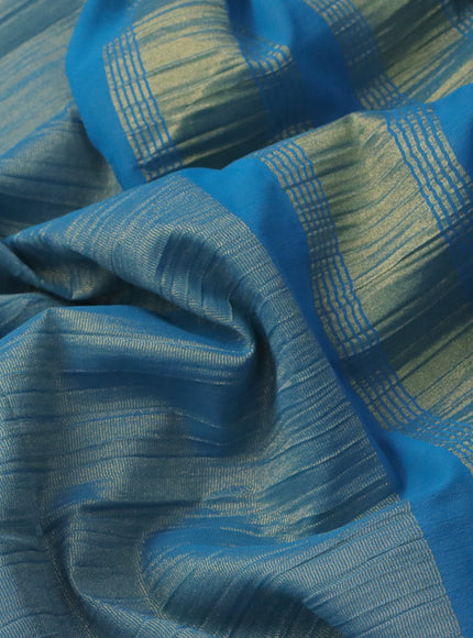 Crushed tissue saree cs blue with plain body and zari woven border