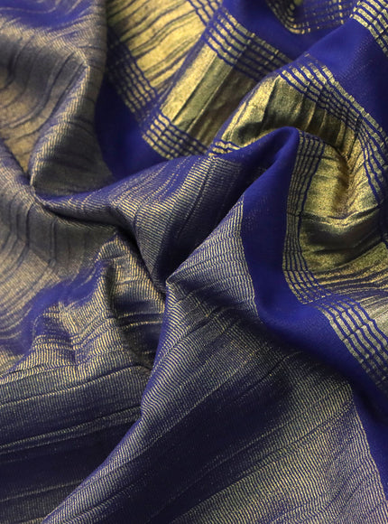 Crushed tissue saree blue shade with plain body and zari woven border