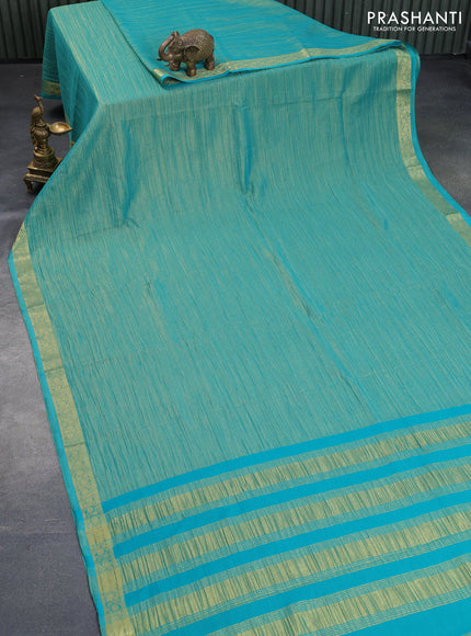 Crushed tissue saree teal blue with plain body and zari woven border