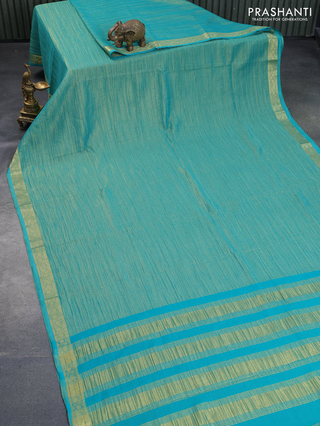 Crushed tissue saree teal blue with plain body and zari woven border