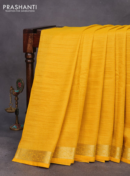 Crushed tissue saree mango yellow with plain body and zari woven border