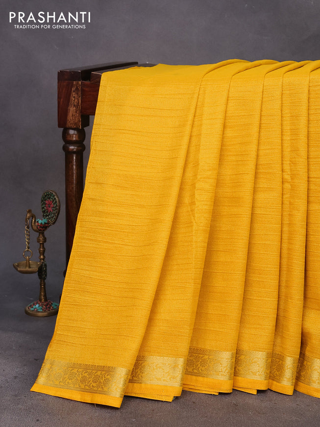 Crushed tissue saree mango yellow with plain body and zari woven border