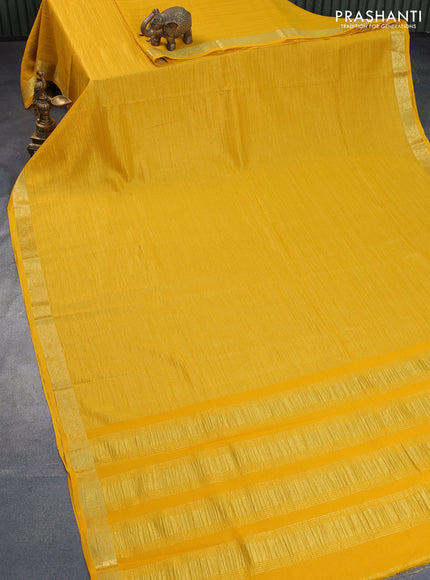 Crushed tissue saree mango yellow with plain body and zari woven border