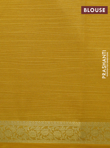 Crushed tissue saree mango yellow with plain body and zari woven border