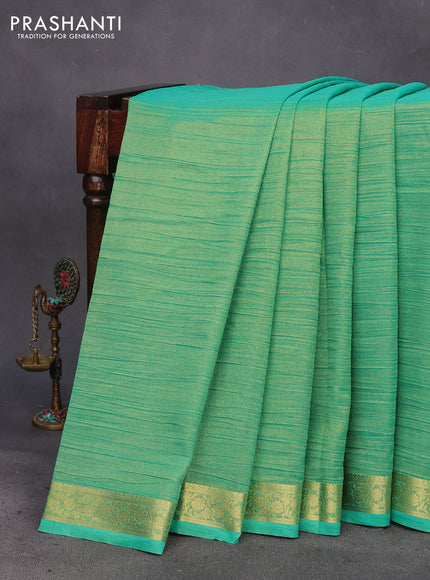 Crushed tissue saree teal green with plain body and zari woven border