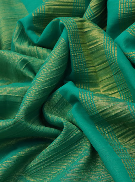 Crushed tissue saree teal green with plain body and zari woven border