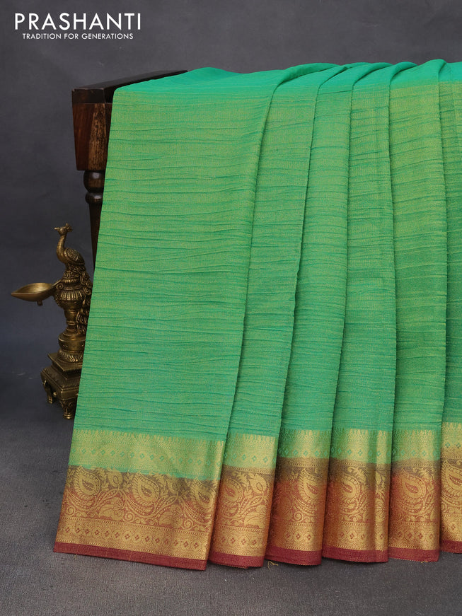 Crushed tissue saree green and wine shade with plain body and zari woven border