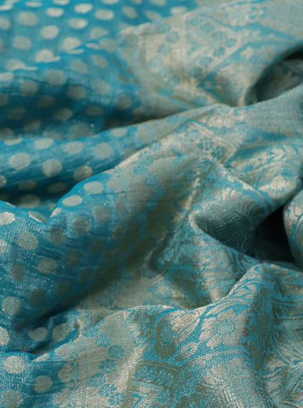 Crushed tissue saree teal blue with allover zari woven buttas and zari woven floral border