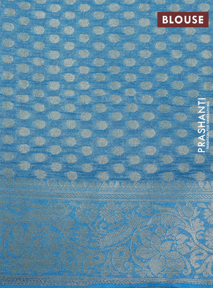 Crushed tissue saree cs blue with allover zari woven buttas and zari woven floral border