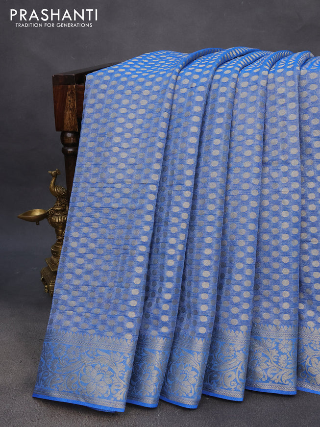 Crushed tissue saree cs blue with allover zari woven buttas and zari woven floral border