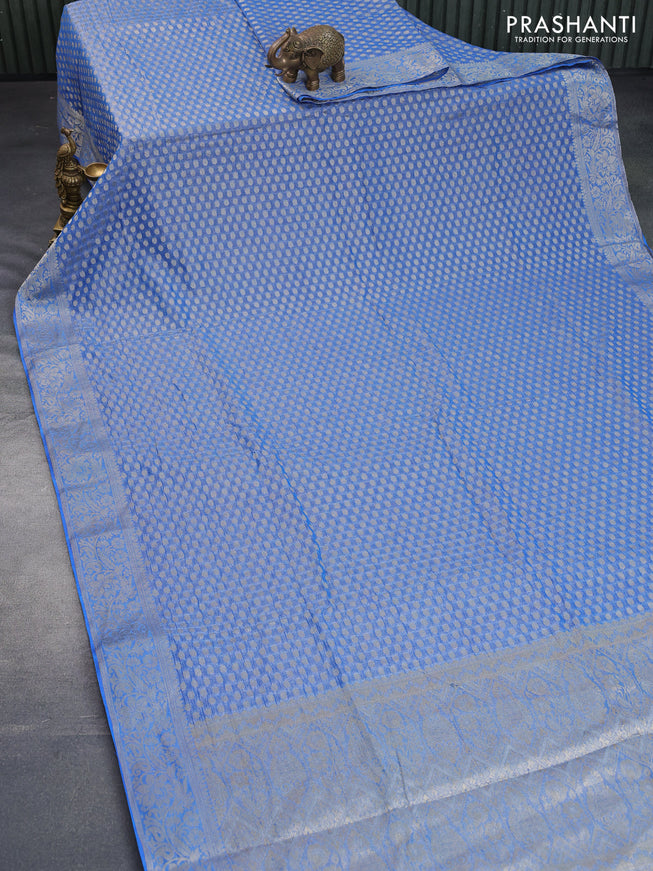 Crushed tissue saree cs blue with allover zari woven buttas and zari woven floral border