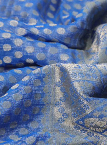 Crushed tissue saree cs blue with allover zari woven buttas and zari woven floral border