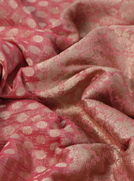 Crushed tissue saree peach pink with allover zari woven buttas and zari woven floral border