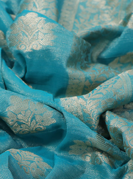 Crushed tissue saree teal blue with zari woven buttas and zari woven floral border