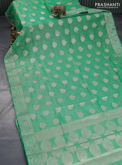 Crushed tissue saree teal green with zari woven buttas and zari woven floral border