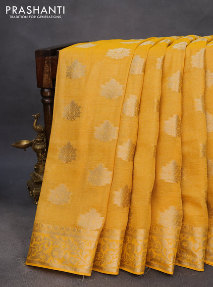 Crushed tissue saree mango yellow with zari woven buttas and zari woven floral border