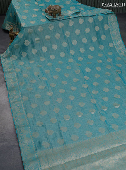 Crushed tissue saree teal blue with zari woven buttas and zari woven floral border