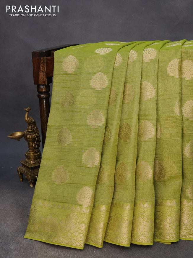 Crushed tissue saree mehendi green with zari woven buttas and zari woven floral border