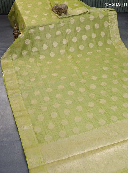 Crushed tissue saree mehendi green with zari woven buttas and zari woven floral border