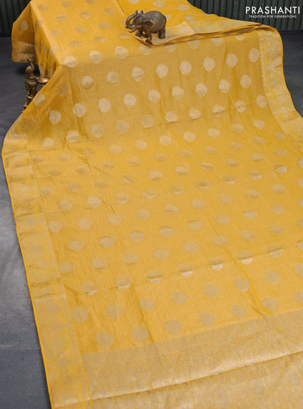 Crushed tissue saree mango yellow with zari woven buttas and zari woven floral border