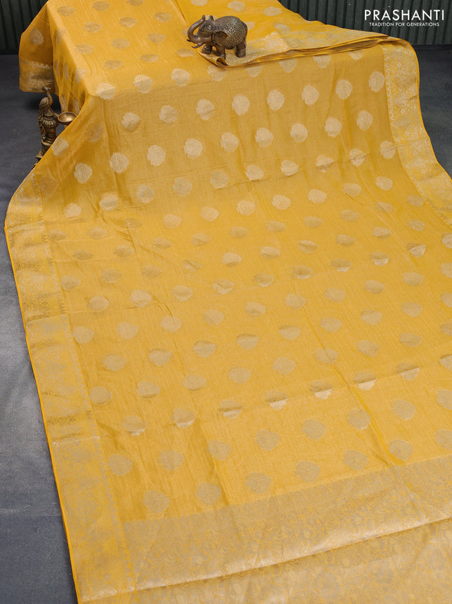 Crushed tissue saree mango yellow with zari woven buttas and zari woven floral border