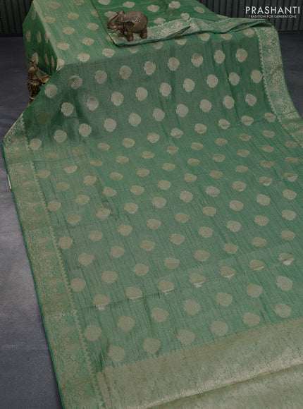 Crushed tissue saree green with zari woven buttas and zari woven floral border