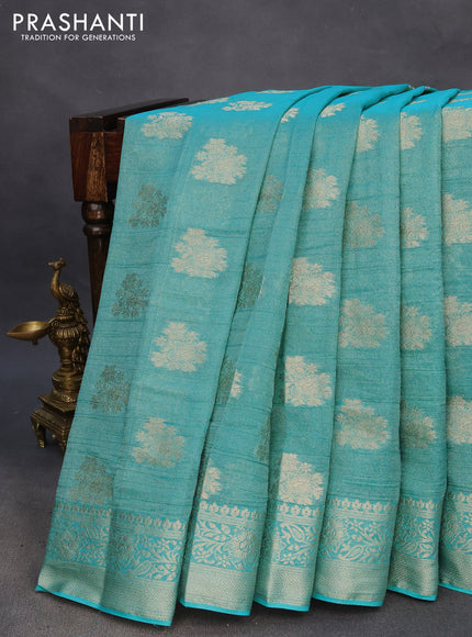 Crushed tissue saree teal blue with zari woven buttas and zari woven floral border