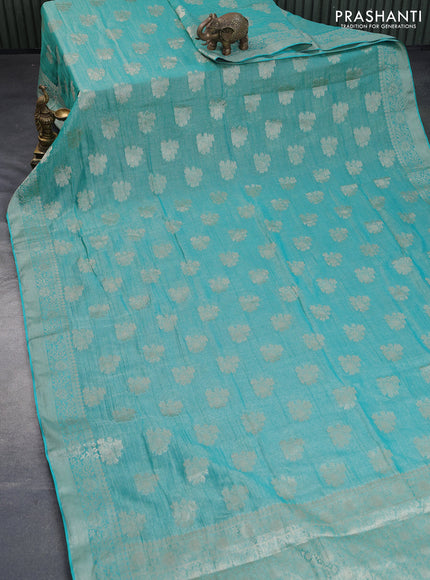 Crushed tissue saree teal blue with zari woven buttas and zari woven floral border