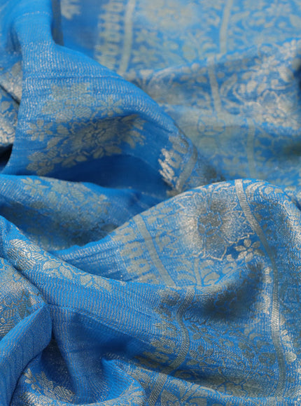 Crushed tissue saree cs blue with zari woven buttas and zari woven floral border