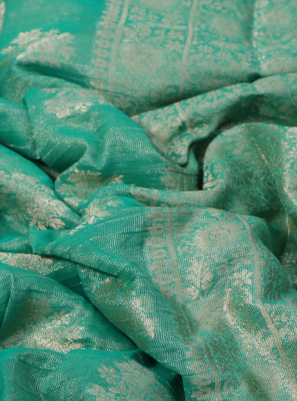 Crushed tissue saree teal green with zari woven buttas and zari woven floral border