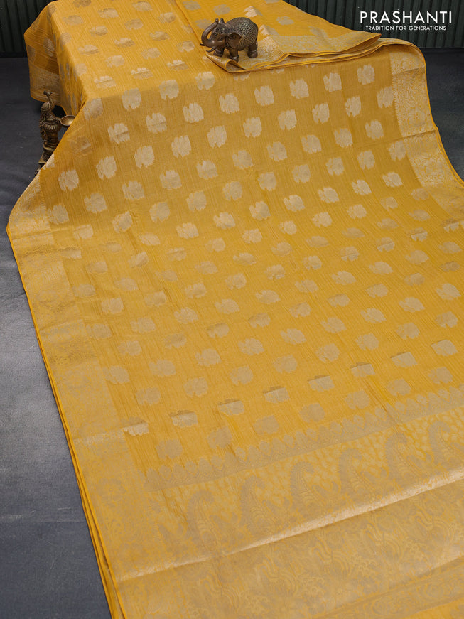 Crushed tissue saree yellow with zari woven floral buttas and zari woven floral border