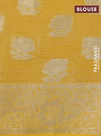 Crushed tissue saree yellow with zari woven floral buttas and zari woven floral border