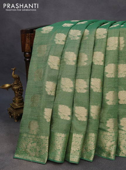 Crushed tissue saree green with zari woven floral buttas and zari woven floral border