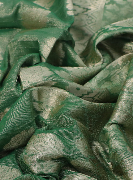 Crushed tissue saree green with zari woven floral buttas and zari woven floral border