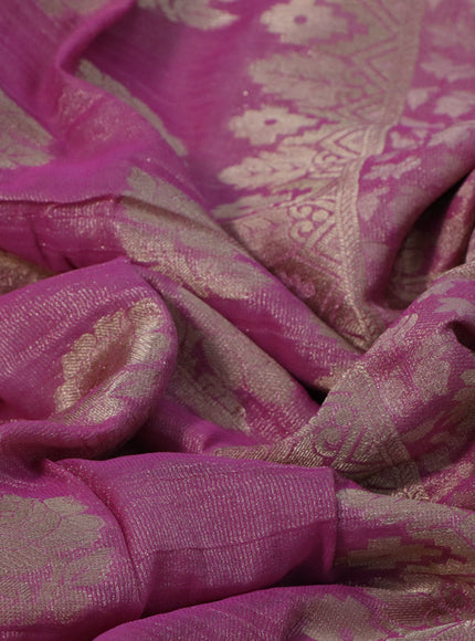 Crushed tissue saree light pink with zari woven floral buttas and zari woven floral border