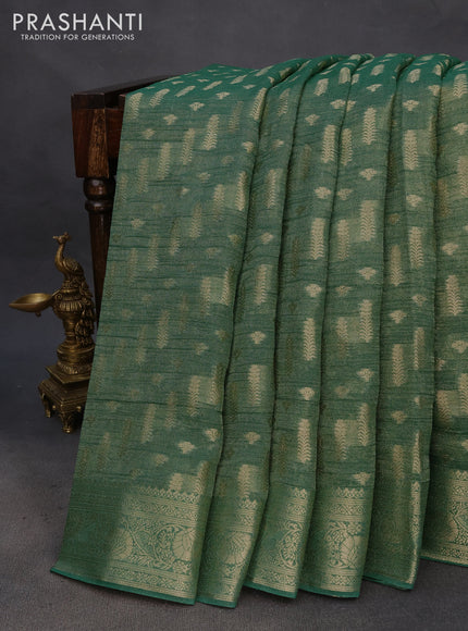 Crushed tissue saree green with allover zari woven buttas and zari woven floral border