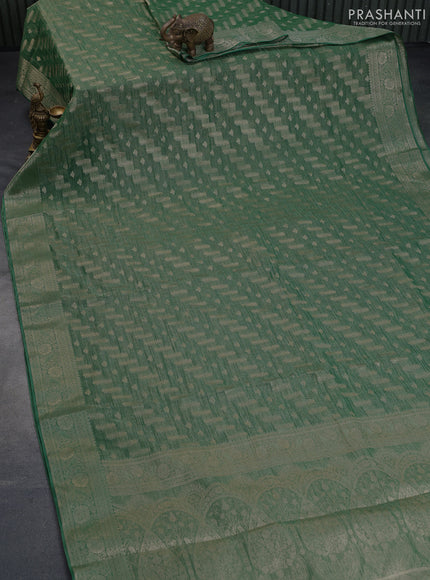 Crushed tissue saree green with allover zari woven buttas and zari woven floral border