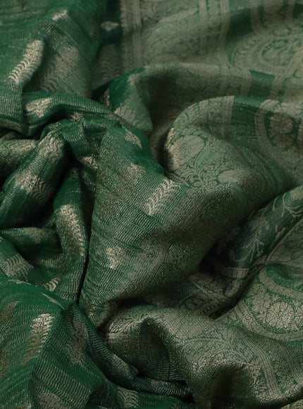 Crushed tissue saree green with allover zari woven buttas and zari woven floral border