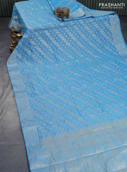 Crushed tissue saree cs blue with allover zari woven buttas and zari woven floral border