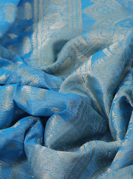 Crushed tissue saree cs blue with allover zari woven buttas and zari woven floral border