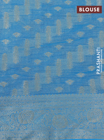 Crushed tissue saree cs blue with allover zari woven buttas and zari woven floral border