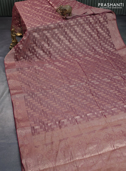 Crushed tissue saree dual shade of wine shade with allover zari woven buttas and zari woven floral border