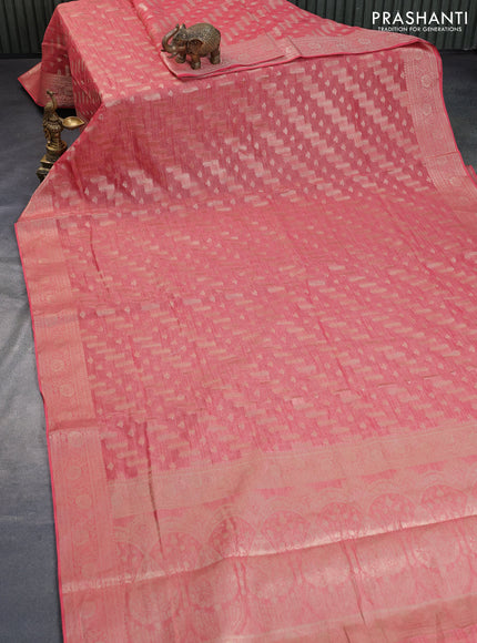 Crushed tissue saree peach pink with allover zari woven buttas and zari woven floral border