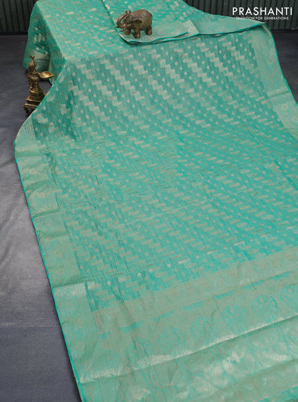 Crushed tissue saree teal green with allover zari woven buttas and zari woven floral border