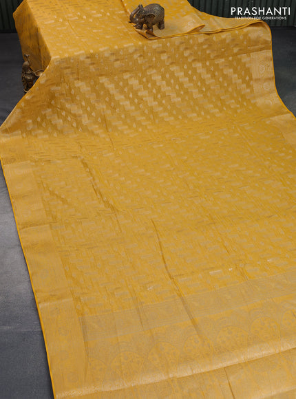 Crushed tissue saree yellow with allover zari woven buttas and zari woven floral border